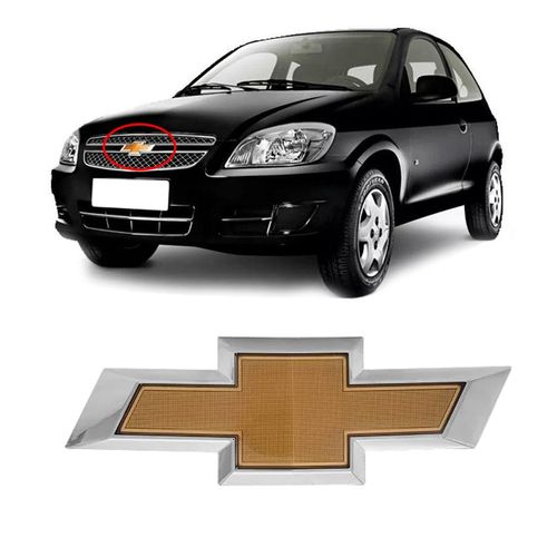 EMBLEMA GM GRADE RADIADOR CELTA 2011 A 2016 GRAVATA DOURADA MARÇON