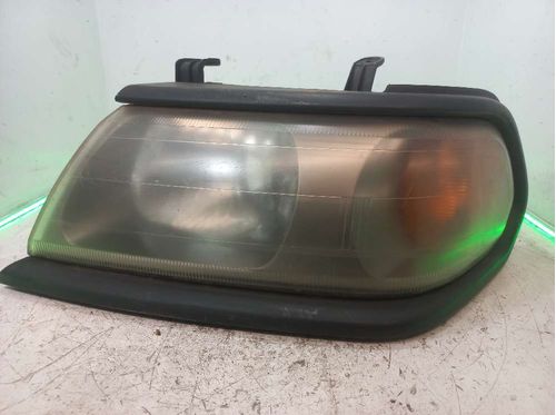 FAROL ESQUERDO MITSUBISHI PAJERO 2.8 2004